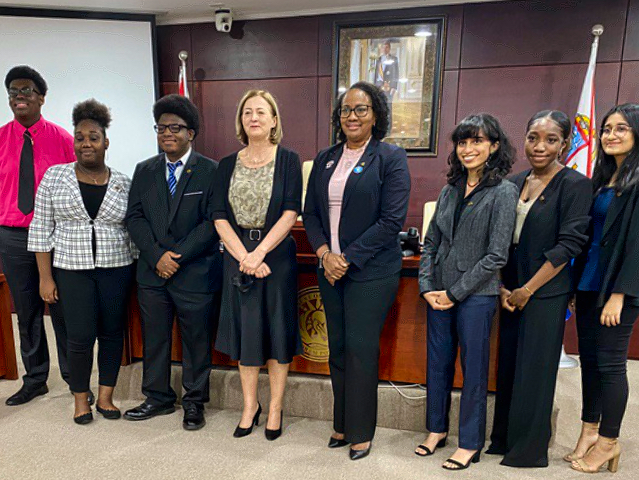 Sara Bharwani with youth parliamentary representatives of St Maarten
